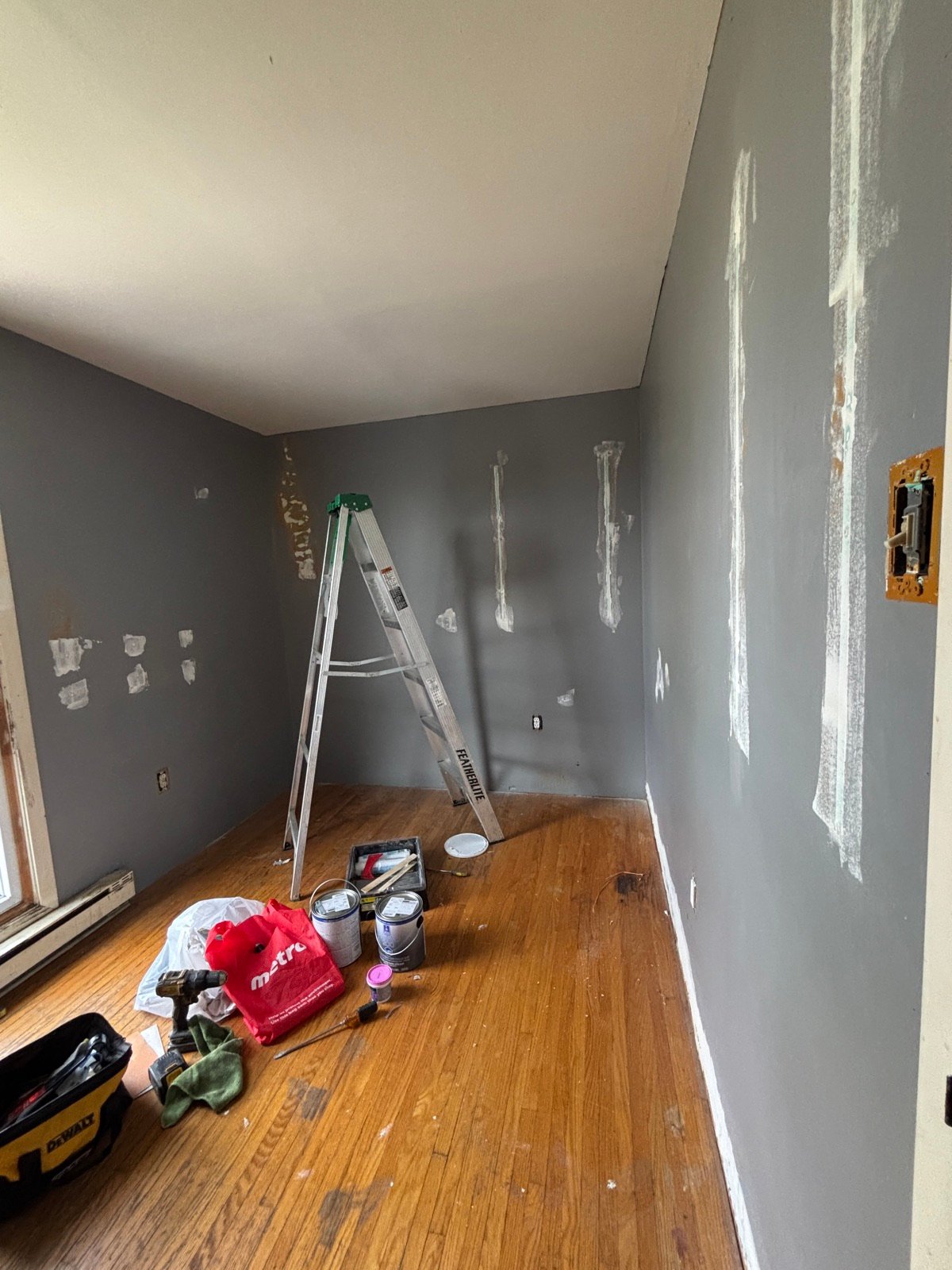 Bedroom before being repainted by The Hamilton Painting Company in Hamilton, Ontario